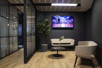 Reception area with TV Espressa on floor